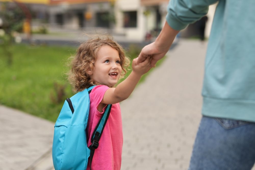 Woman,And,Her,Little,Daughter,On,Their,Way,To,Kindergarten