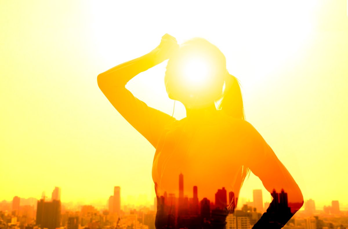 Double exposure portrait of young fitness Woman hand wiping sweat and summer heat wave concept hőség